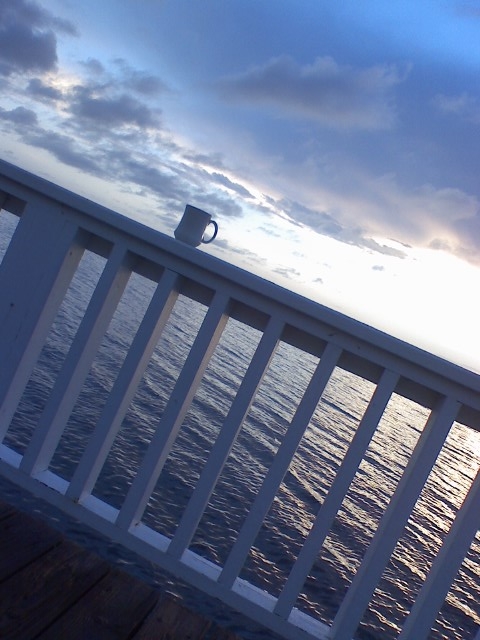 dock with coffee cup